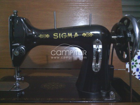 Se vende maquina de coser sigma.