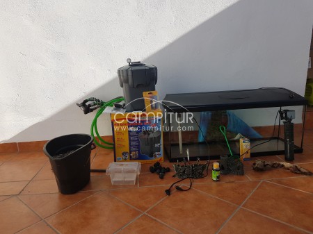 vendo acuario de 90 litros y filtro exterior sera 250 UV